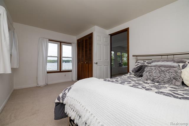 Builiding view fourteen for 8691 Cooley Lake, Commerce Township, MI. 48382