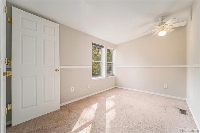 Builiding view nine for 6197 Carroll Lake, Commerce Township, MI. 48382