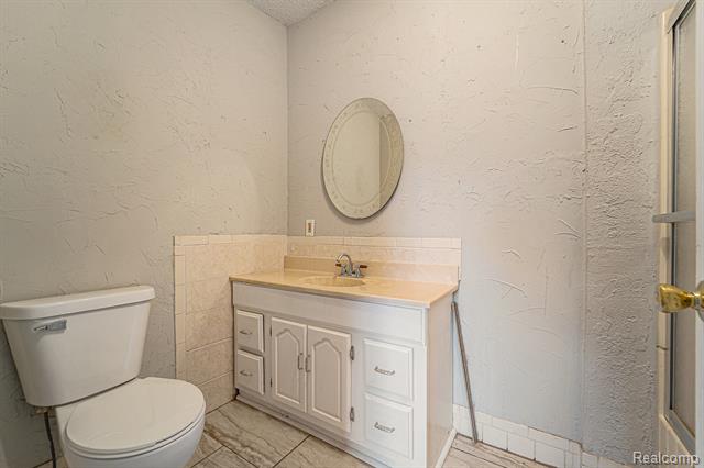 Builiding view thirteen for 6197 Carroll Lake, Commerce Township, MI. 48382