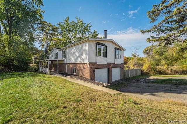 Builiding view three for 6197 Carroll Lake, Commerce Township, MI. 48382