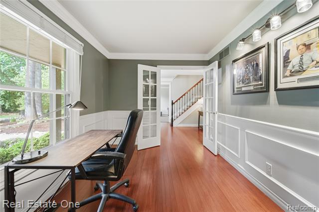 Builiding view five for 219 Briarwood, Highland, MI. 48357