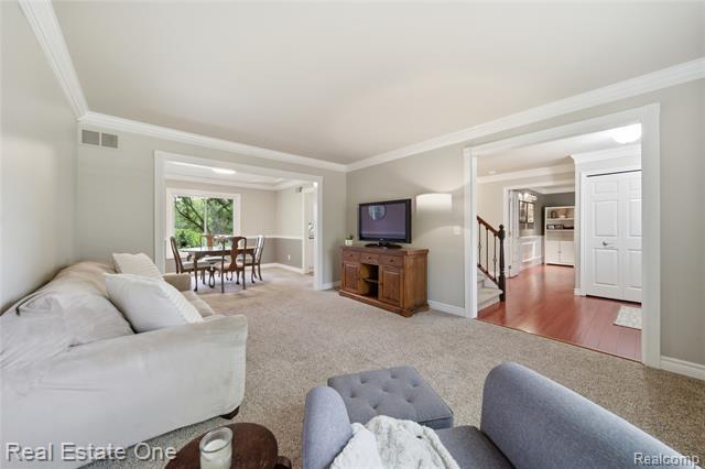 Builiding view seven for 219 Briarwood, Highland, MI. 48357