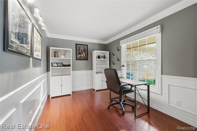 Builiding view six for 219 Briarwood, Highland, MI. 48357