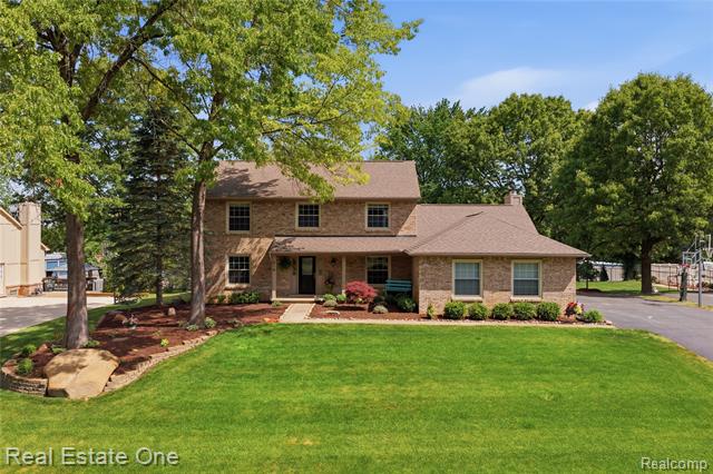 front view for 219 Briarwood Dr, Highland, Mi. 48357
