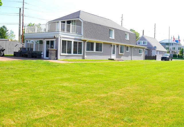 Builiding view five for 1704 Cass Lake Front, Keego Harbor, MI. 48320