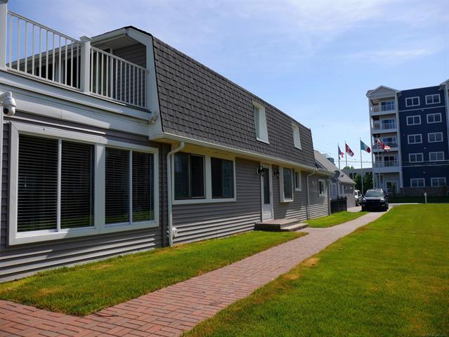 Builiding view six for 1704 Cass Lake Front, Keego Harbor, MI. 48320