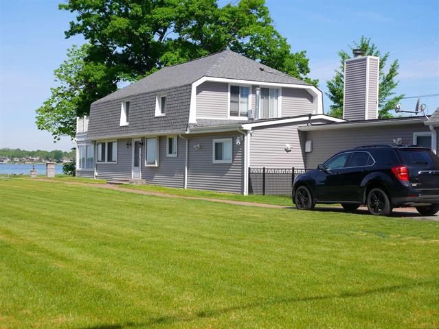 Builiding view three for 1704 Cass Lake Front, Keego Harbor, MI. 48320