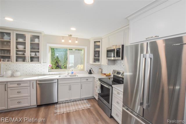 Builiding view five for 8426 Cooley Beach, White Lake, MI. 48386