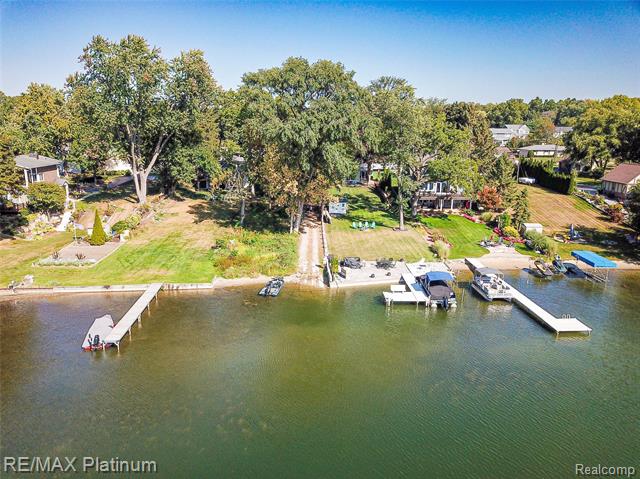 Builiding view sixty five for 8426 Cooley Beach, White Lake, MI. 48386