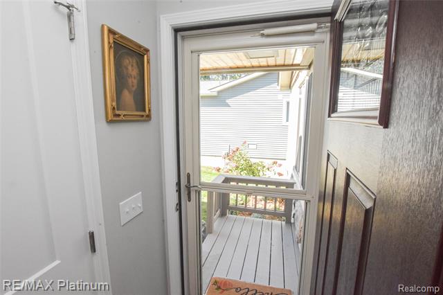 Builiding view three for 8426 Cooley Beach, White Lake, MI. 48386