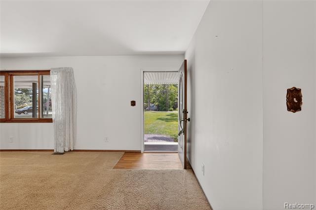 Builiding view four for 8668 Cooley Beach, White Lake, MI. 48386