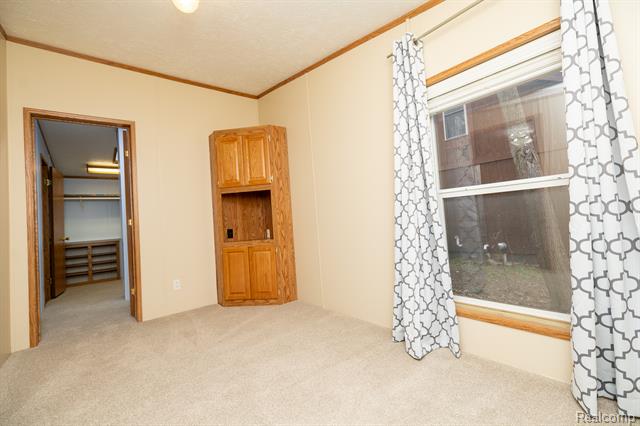 Builiding view sixteen for 9198 Ashdown, White Lake, MI. 48386