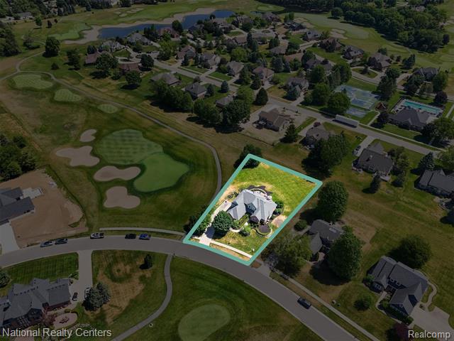 Builiding view forty nine for 1042 Saint Andrews, Highland, MI. 48357