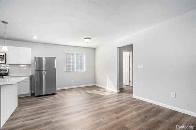 Builiding view eight for 8157 Moonlight Creek, Fowlerville, MI. 48836