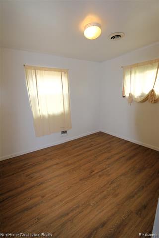 Builiding view five for 6259 Mercury, Burton, MI. 48509