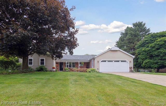 front view for 6573 Grand Circle Drive, Brighton, Mi. 48116