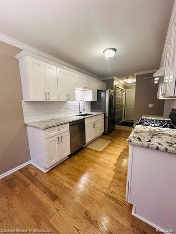 Builiding view seven for 4896 Royal Cove, Shelby Township, MI. 48316