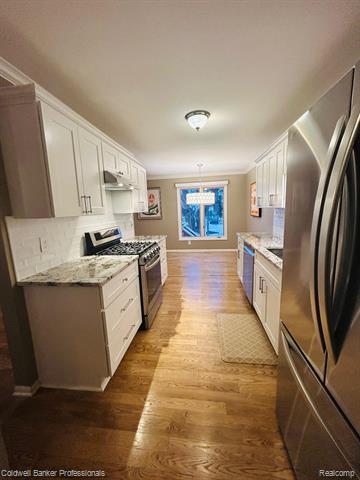 Builiding view six for 4896 Royal Cove, Shelby Township, MI. 48316