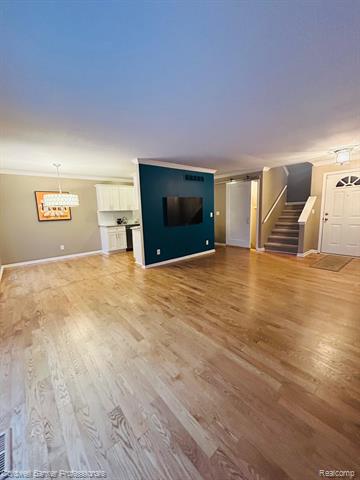 Builiding view three for 4896 Royal Cove, Shelby Township, MI. 48316