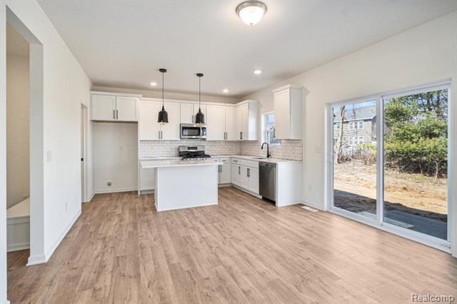 Builiding view five for 392 Golfside, Lapeer, MI. 48446