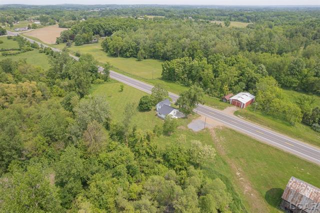 Builiding view forty for 11943 Us 223, Onsted, MI. 49265
