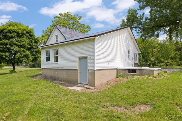 Builiding view two for 11943 Us 223, Onsted, MI. 49265