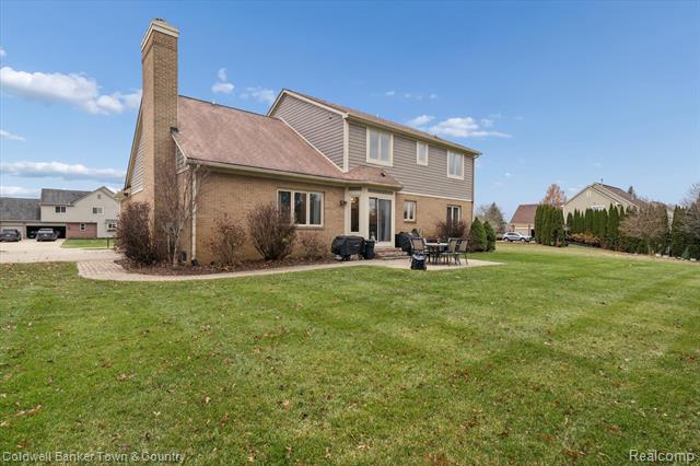 Builiding view fifty five for 274 Carnoustie, Highland, MI. 48357