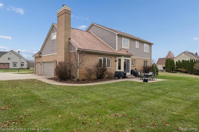 Builiding view fifty four for 274 Carnoustie, Highland, MI. 48357