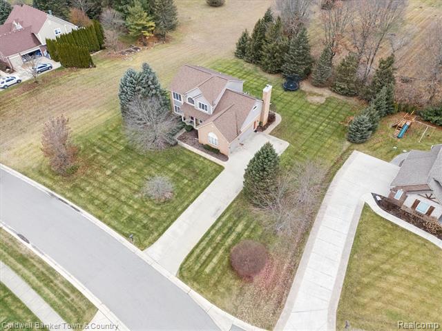 Builiding view fifty nine for 274 Carnoustie, Highland, MI. 48357