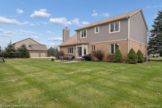 Builiding view fifty one for 274 Carnoustie, Highland, MI. 48357