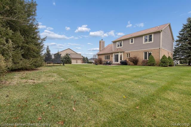 Builiding view fifty two for 274 Carnoustie, Highland, MI. 48357