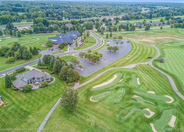 Builiding view seventy four for 274 Carnoustie, Highland, MI. 48357