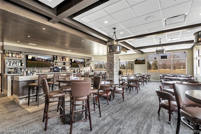 Builiding view seventy six for 274 Carnoustie, Highland, MI. 48357