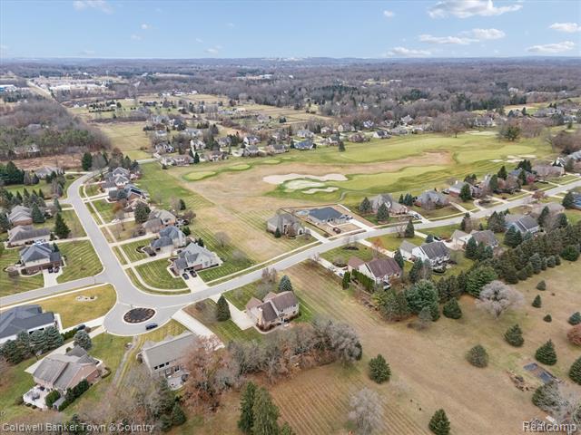 Builiding view sixty five for 274 Carnoustie, Highland, MI. 48357