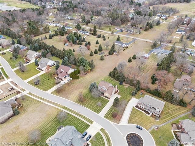 Builiding view sixty four for 274 Carnoustie, Highland, MI. 48357