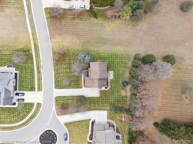 Builiding view sixty seven for 274 Carnoustie, Highland, MI. 48357