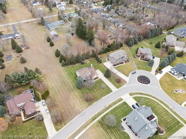 Builiding view sixty three for 274 Carnoustie, Highland, MI. 48357