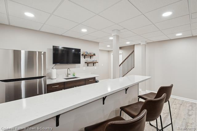 Builiding view thirty eight for 274 Carnoustie, Highland, MI. 48357