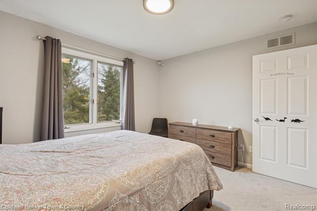 Builiding view thirty for 274 Carnoustie, Highland, MI. 48357