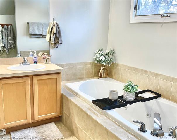 Builiding view twenty five for 274 Carnoustie, Highland, MI. 48357