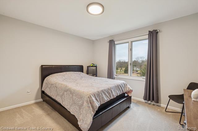 Builiding view twenty nine for 274 Carnoustie, Highland, MI. 48357