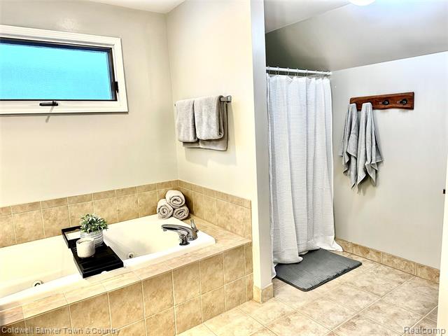 Builiding view twenty six for 274 Carnoustie, Highland, MI. 48357