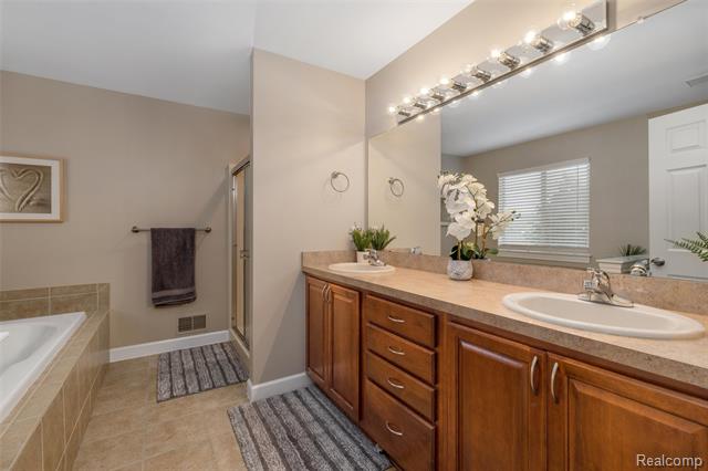 Builiding view eleven for 297 Gleneagles, Highland, MI. 48357