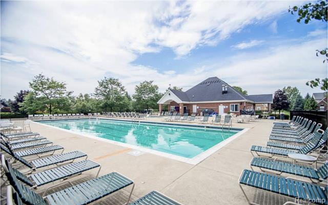 Builiding view thirty four for 297 Gleneagles, Highland, MI. 48357