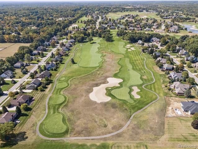 Builiding view thirty three for 297 Gleneagles, Highland, MI. 48357