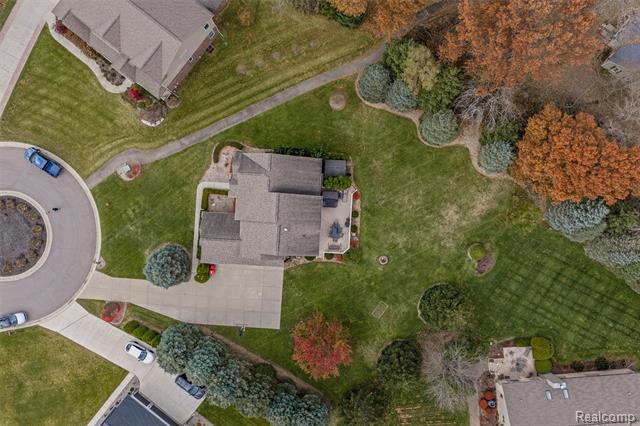 Builiding view thirty for 297 Gleneagles, Highland, MI. 48357