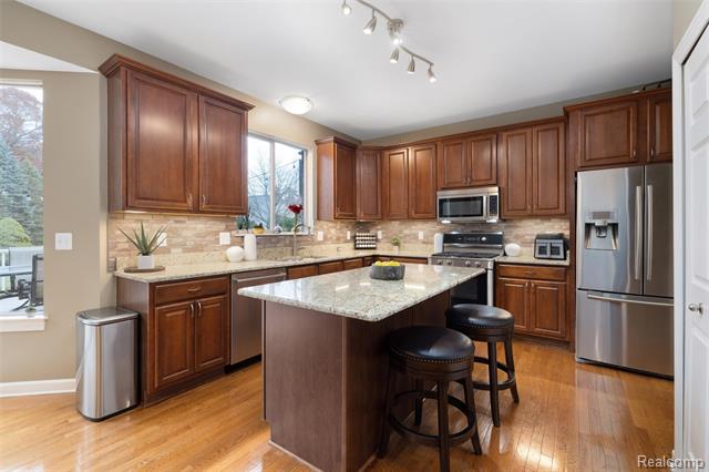 Builiding view two for 297 Gleneagles, Highland, MI. 48357