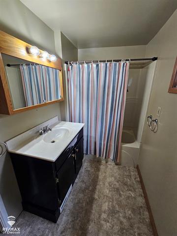 Builiding view eleven for 209 Stewart, Owosso, MI. 48867