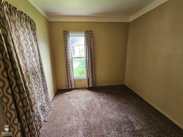 Builiding view five for 209 Stewart, Owosso, MI. 48867