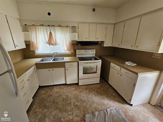 Builiding view fourteen for 209 Stewart, Owosso, MI. 48867